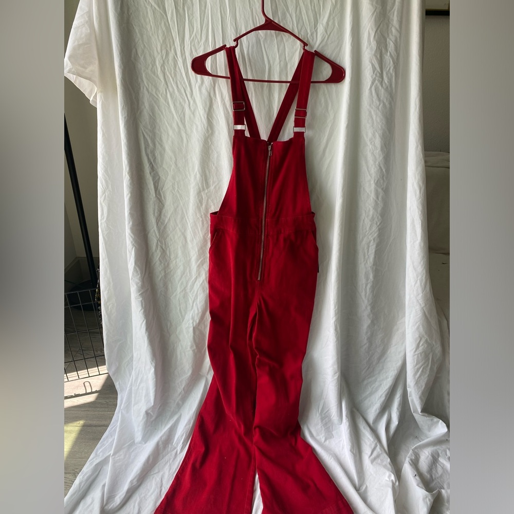 Cherry red overalls with crossed back and boot cut pants, never worn
